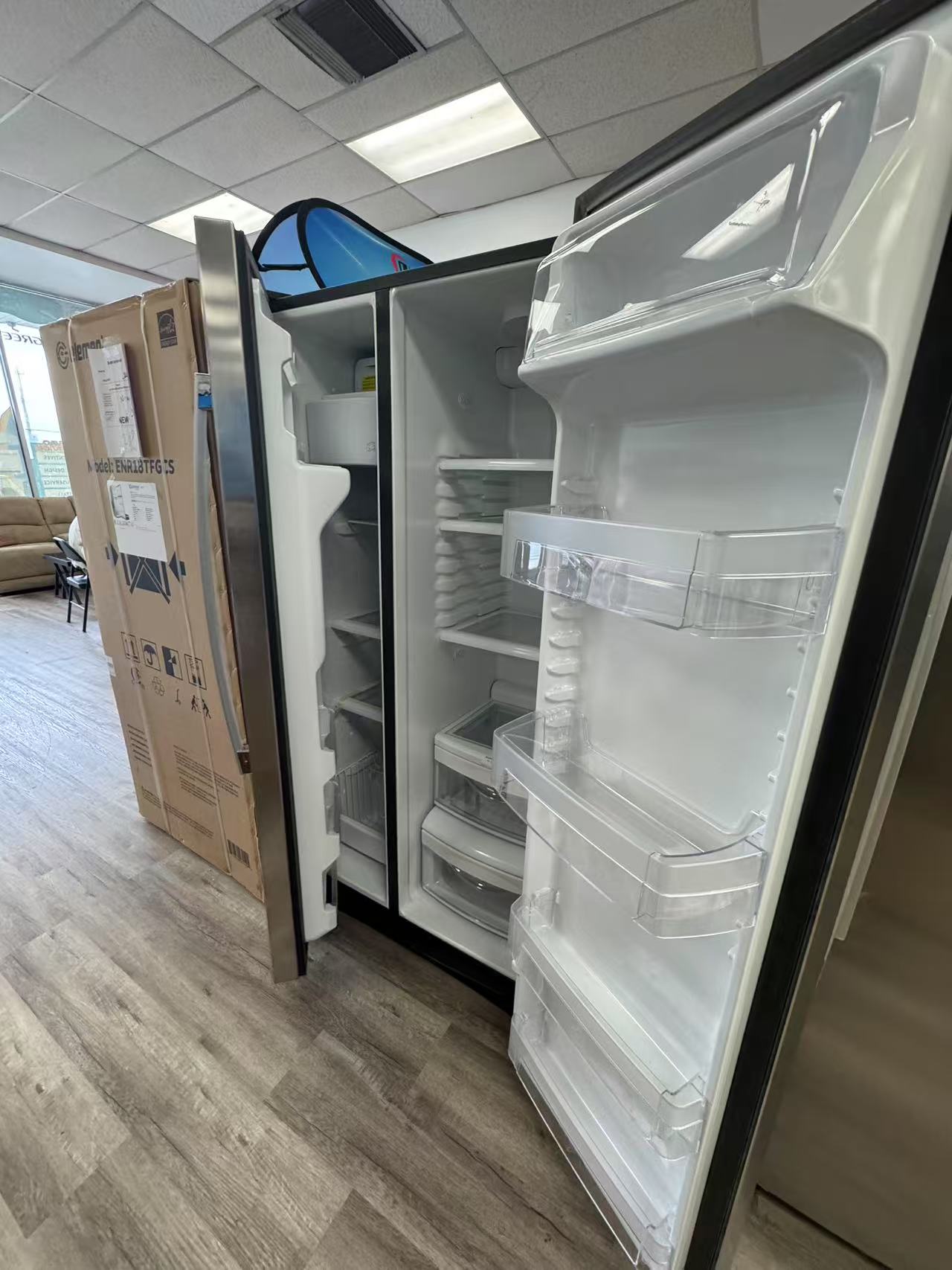 GE 21.9 Cu . Ft. Counter - Depth Side - By-Side Refrigerator