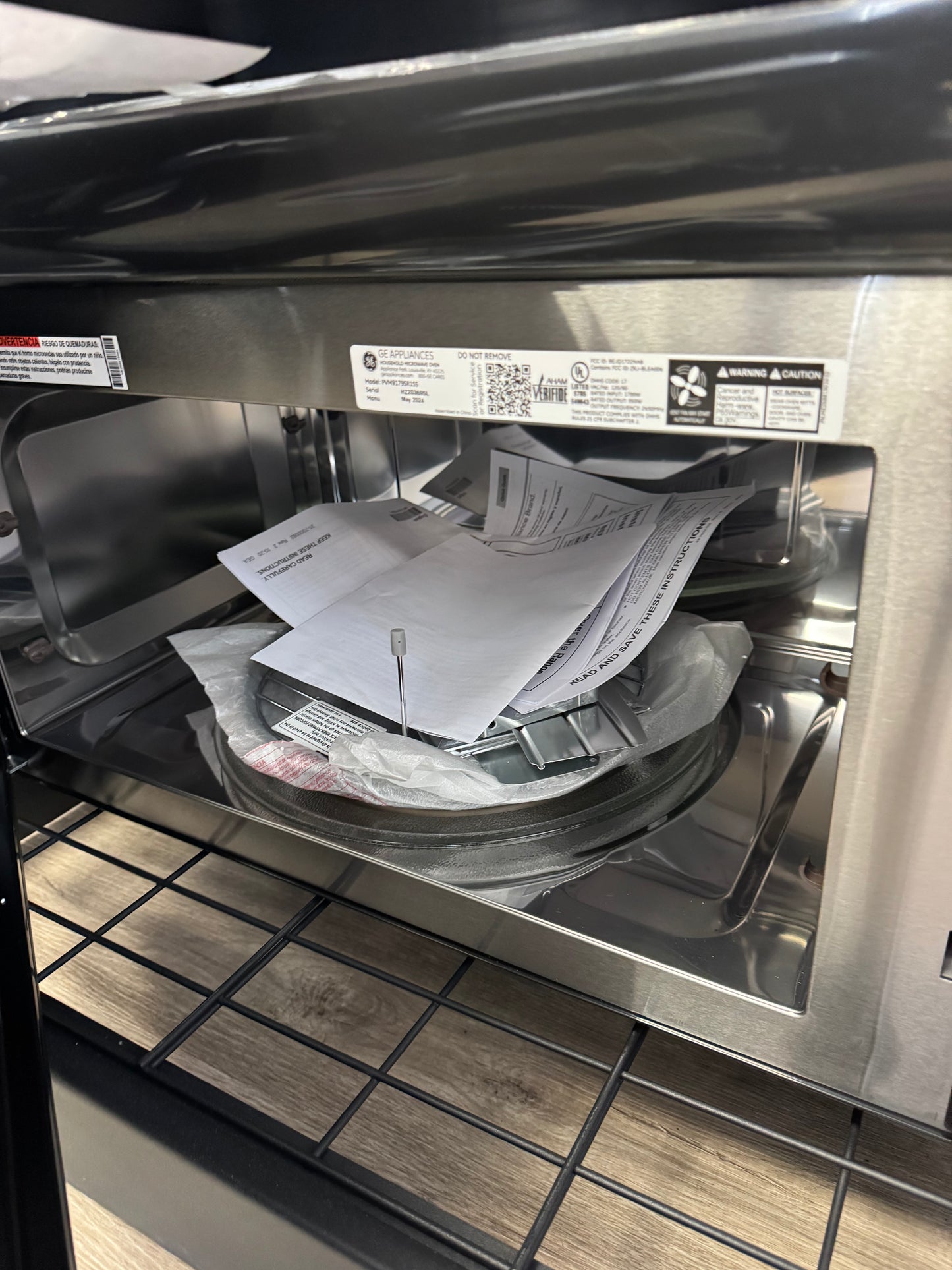 GE Profile 1.7’’ Cu. Ft. Conversation Over-the-Range Microwave Oven
