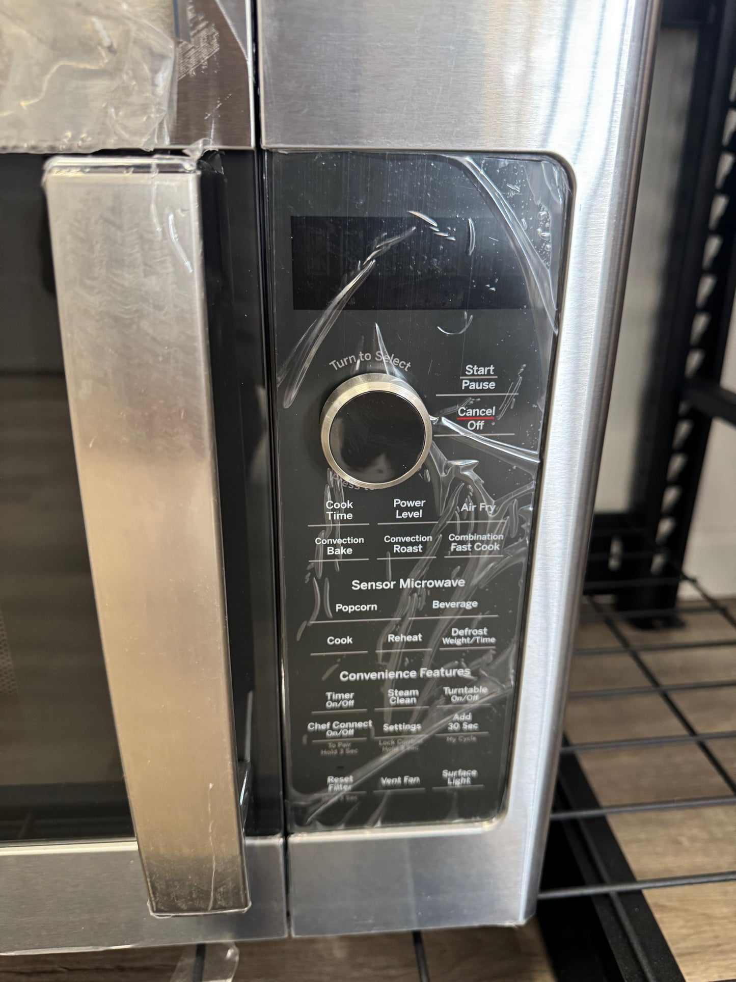 GE Profile 1.7’’ Cu. Ft. Conversation Over-the-Range Microwave Oven